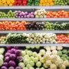Colorful vegetables neatly stacked in a store, perfect for your anti-inflammatory grocery list